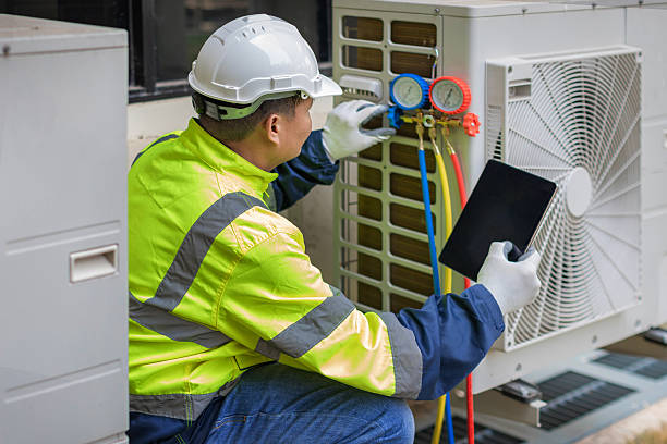Professional Air Conditioning Repair technician working in Houston, PA